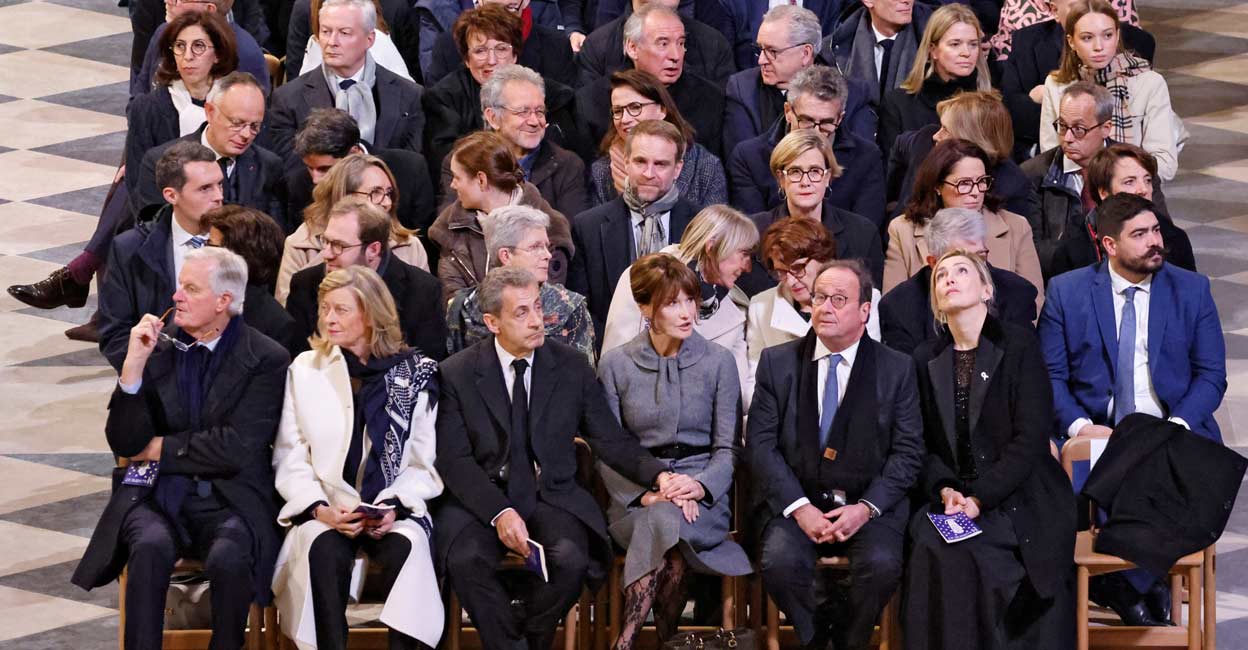 FRANCE-NOTREDAME Outgoing French Prime Minister Michel Barnier and his wife Isabelle Altmayer, Former French President Nicolas Sarkozy and his wife French-Italian singer Carla Bruni-Sarkozy and former French President Francois Hollande and his wife French actor and film producer Julie Gayet sit inside Notre-Dame Cathedral ahead of a ceremony to mark the re-opening of the landmark cathedral. Photo: LUDOVIC MARIN/Pool via REUTERS