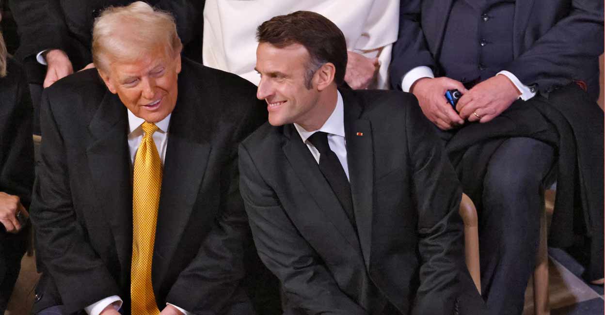 FRANCE-NOTREDAME French President Emmanuel Macron and U.S. President-elect Donald Trump sit inside Notre-Dame de Paris Cathedral as they attend a ceremony to mark the re-opening of the landmark cathedral. Photo: LUDOVIC MARIN/Pool via REUTERS