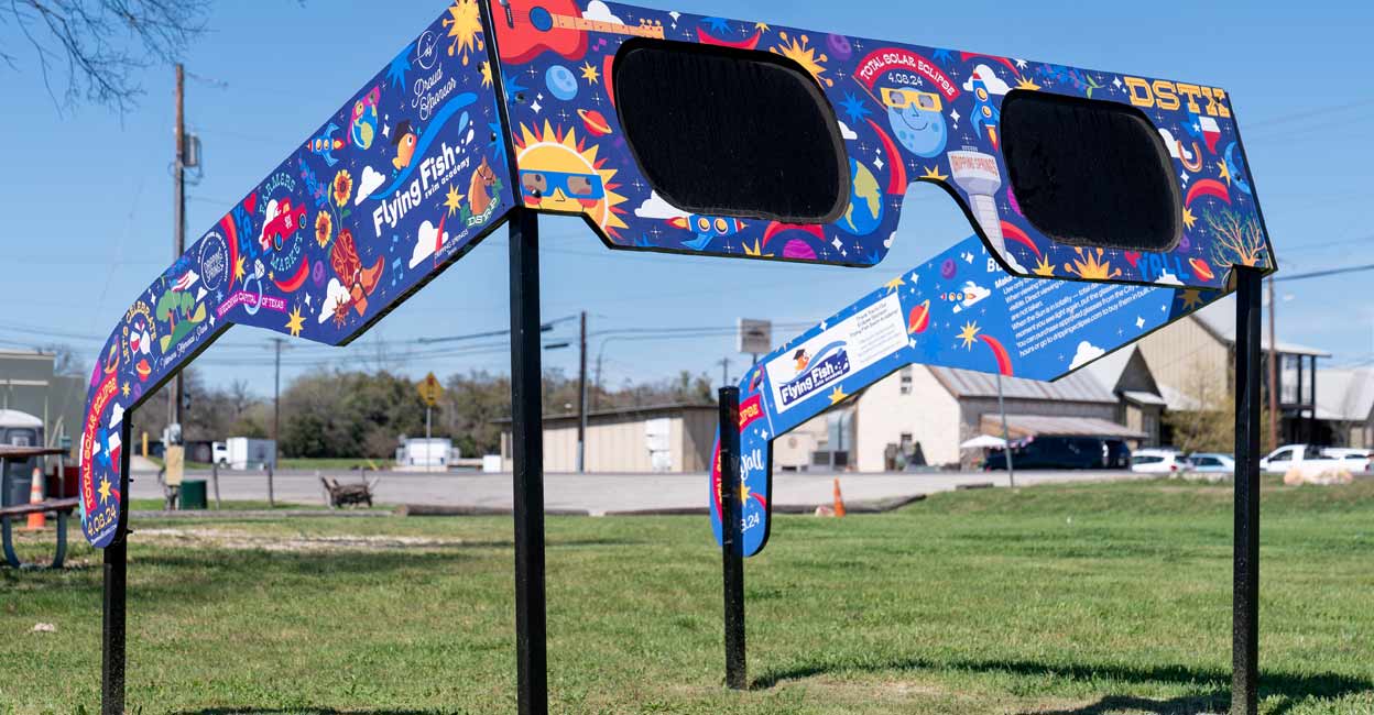 The City of Dripping Springs, Texas, prepares for the solar eclipse with a set of larger than life glasses on display at Veterans Memorial Park. Photo: SUZANNE CORDEIRO / AFP / File