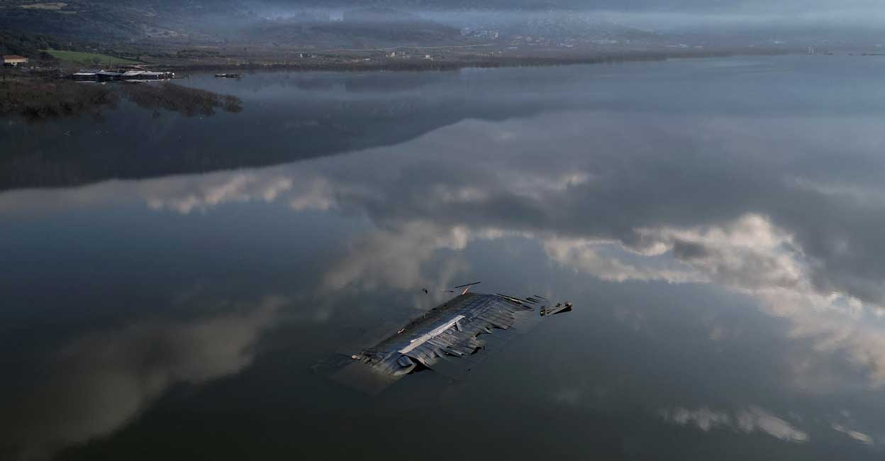 A livestock farm is almost entirely submerged by floodwater, following the extreme flooding of last September, in the village of Kanalia, Greece. Photo: Reuters/Alkis Konstantinidis/File Photo