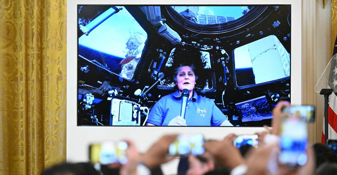 NASA astronaut Sunita Williams speaks from the International Space Station to attendees at a reception in celebration of Diwali, in the East Room of the White House in Washington, DC in October. Photo: Mandel NGAN/AFP