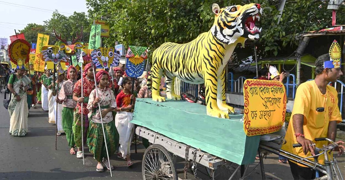People participate in 'Mangal Shobhajatra' to mark the first day of Bengali New Year in Kolkata. Photo: PTI