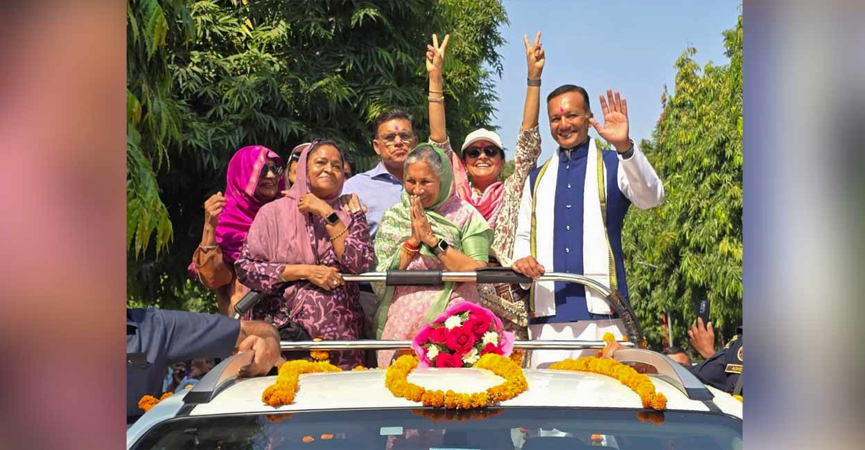 PTI10_08_2024_000280B Independent candidate Savitri Jindal with her son and businessman Naveen Jindal during celebrations after her victory from Hisar constituency in the Haryana Assembly elections, in Hisar. Photo: PTI