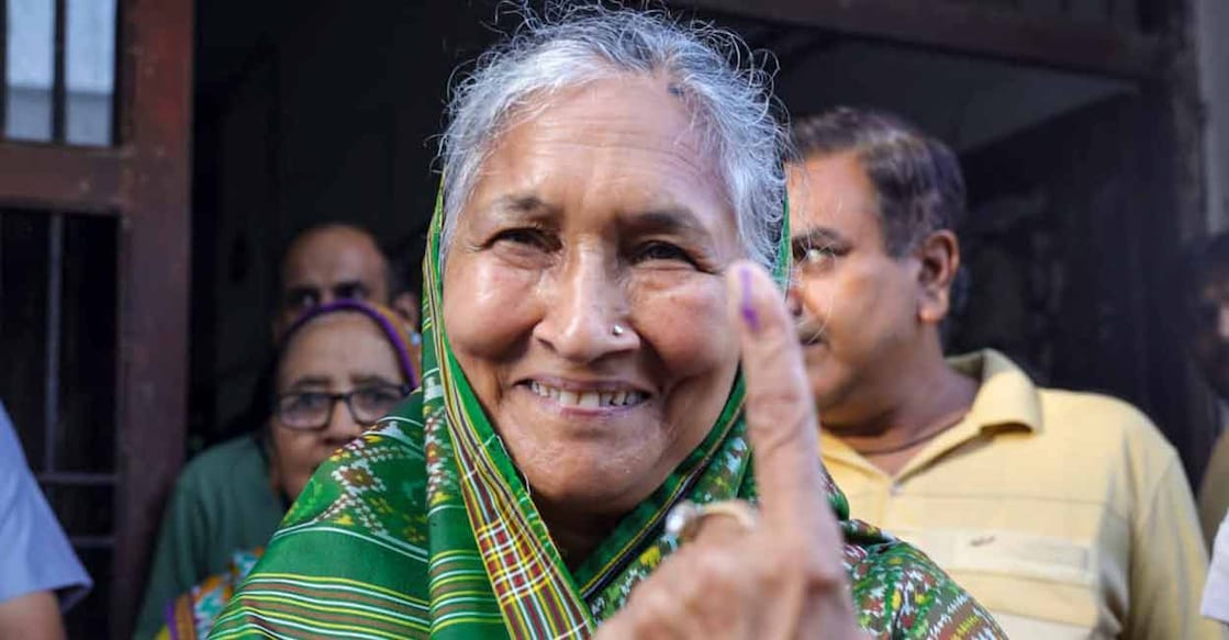 PTI10_05_2024_000211B Savitri Jindal shows her inked finger after her vote during the Haryana Assembly polls, in Hisar. Photo: PTI