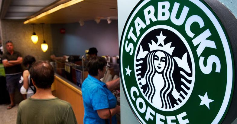 In response to Trump's ban, Starbucks to hire 10,000 refugees over next ...