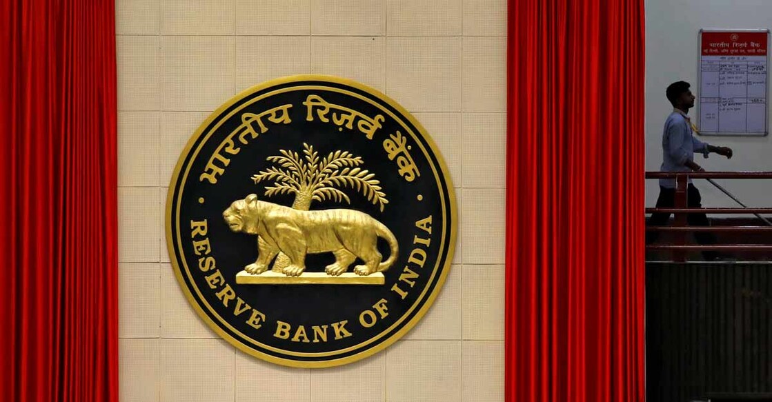 A worker walks past the logo of Reserve Bank of India (RBI) inside its office in New Delhi, India July 8, 2019. File photo: REUTERS/Anushree Fadnavis
