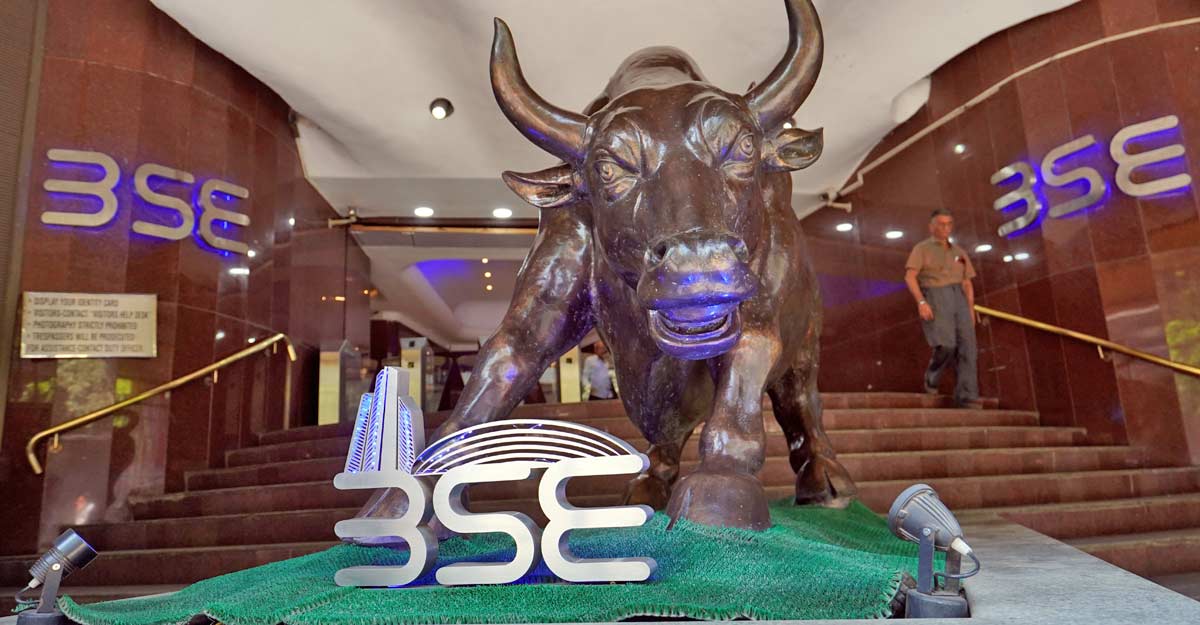 A man walks out of the Bombay Stock Exchange (BSE) building in Mumbai, India, February 28, 2020. REUTERS/Hemanshi Kamani/File Photo