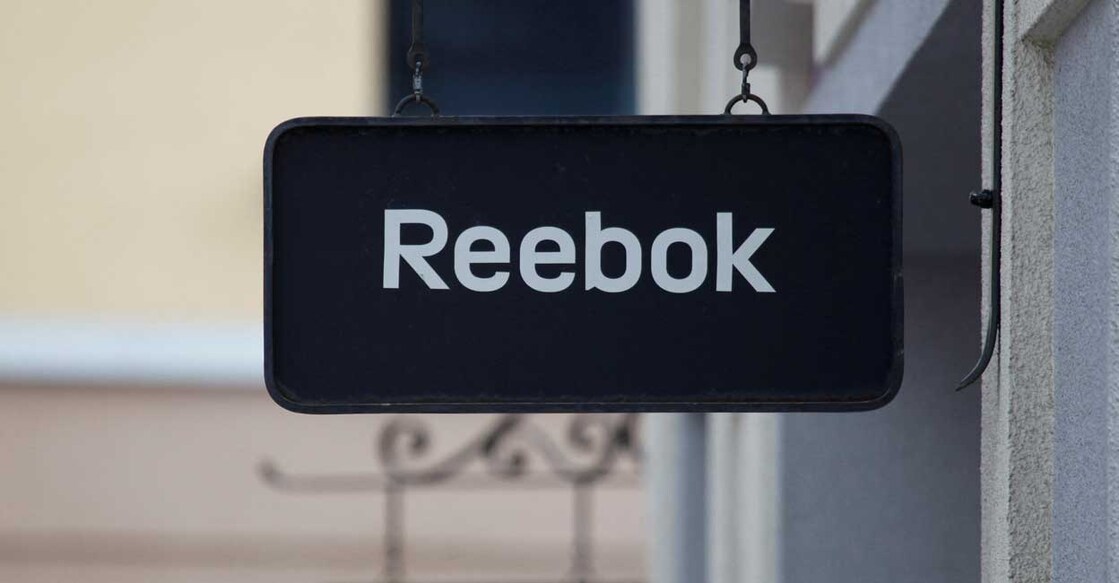 Boards with Reebok store logo are seen on a shopping center at the outlet village Belaya Dacha outside Moscow, Russia, April 23, 2016. Photo: Reuters/Grigory Dukor/File