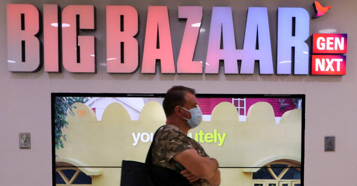 AMAZON-COM-INDIA-FUTURE-RELIANCE A man walks inside the Big Bazaar retail store in Mumbai, November 25, 2020. File Photo: REUTERS/Niharika Kulkarni