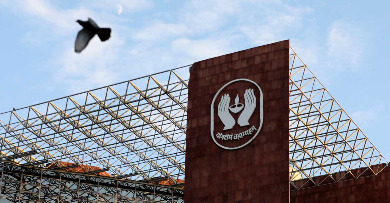 A bird flies past a logo of Life Insurance Corporation of India (LIC) at one of its offices in New Delhi, September 14, 2021. Reuters/Anushree Fadnavis