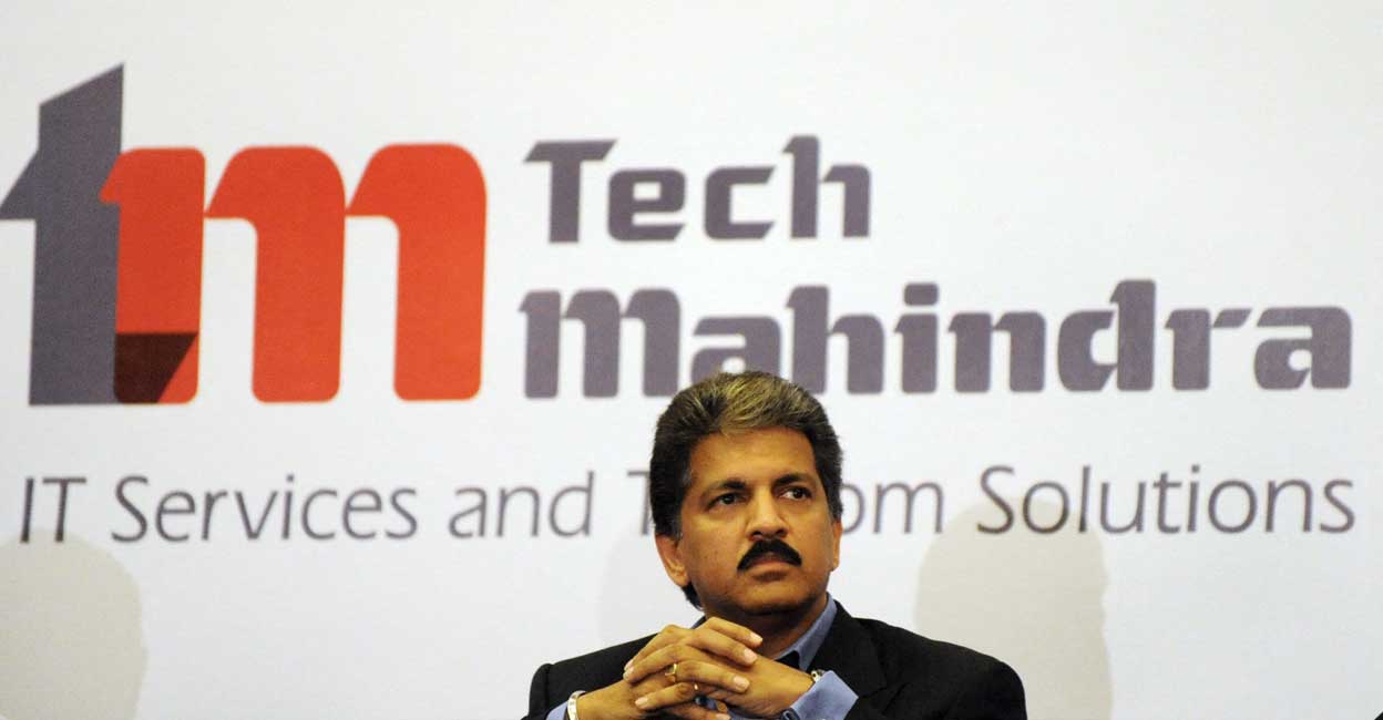 Chairman  of Tech Mahindra, Anand Mahindra listens to a question during a press conference in Hyderabad on April 20, 2009. Photo: Noah Seelam/AFP