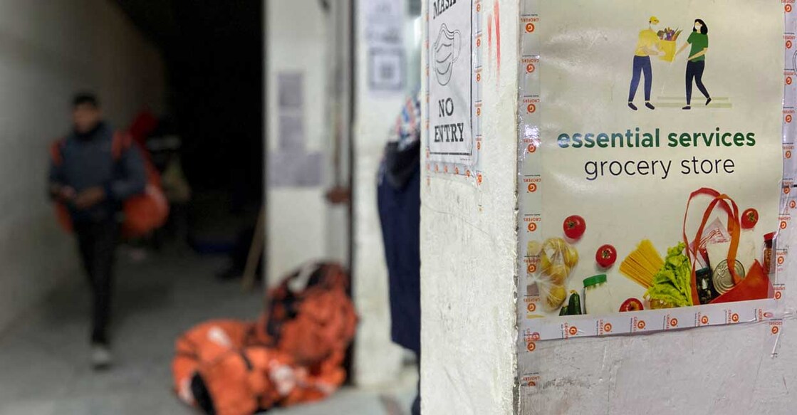 A delivery person leaves a dark store of the SoftBank-funded Blinkit, an Indian company which is offering 10 minute deliveries for groceries, in New Delhi, India, January 19, 2022. Picture taken on January 19, 2022. REUTERS/Anushree Fadnavis
