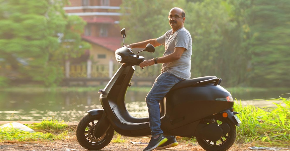 Stajen with his Ola scooter
