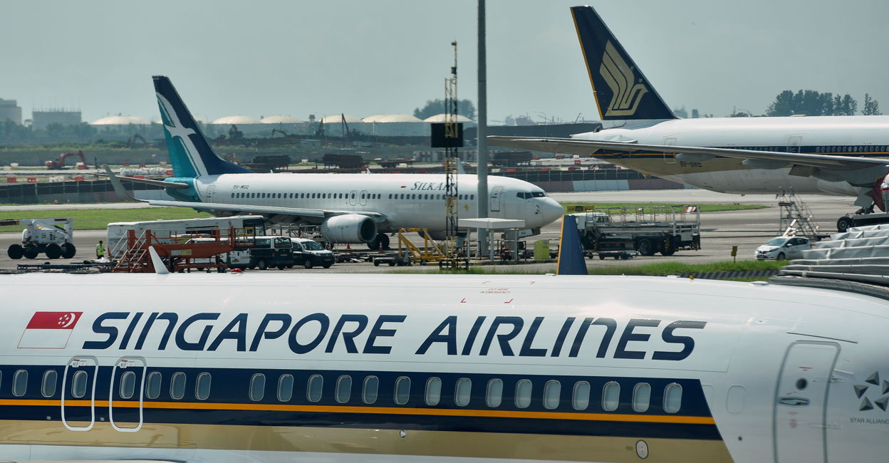 Singapore Airlines planes sit on the tarmac at Changi Airport in Singapore on November 16, 2021. Photo: Reuters