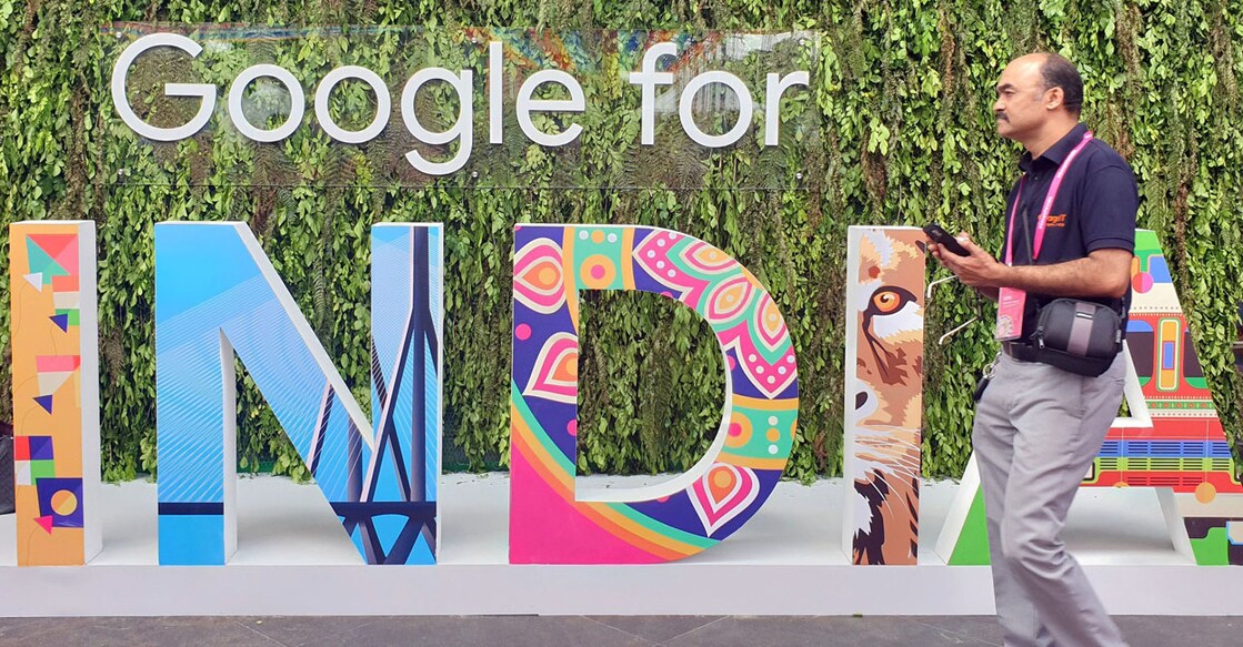 A man walks past the sign of 'Google for India', the company's annual technology event in New Delhi, India on September 19, 2019. Photo: Reuters/ Sankalp Phartiyal