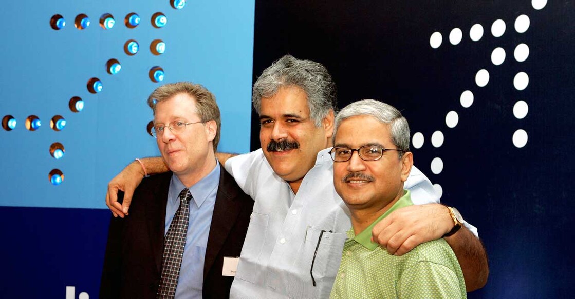 Bruce Ashby (L), President & CEO IndiGo, Rahul Bhatia (C), Managing Director of InterGlobe Enterprises and Rakesh Gangwal pose at the launch of revenue operations of IndiGo, India's newest private low-fare domestic carrier in New Delhi July 31, 2006. Photo: Reuters/Kamal Kishore