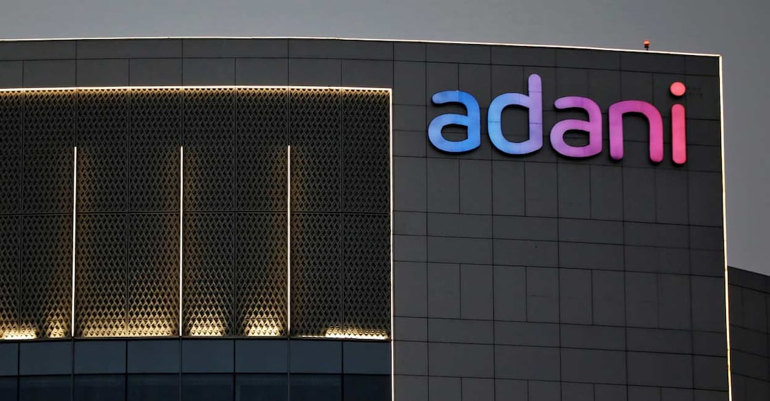 The logo of the Adani Group is seen on the facade of one of its buildings on the outskirts of Ahmedabad, India, April 13, 2021. Photo: Reuters/Amit Dave/File