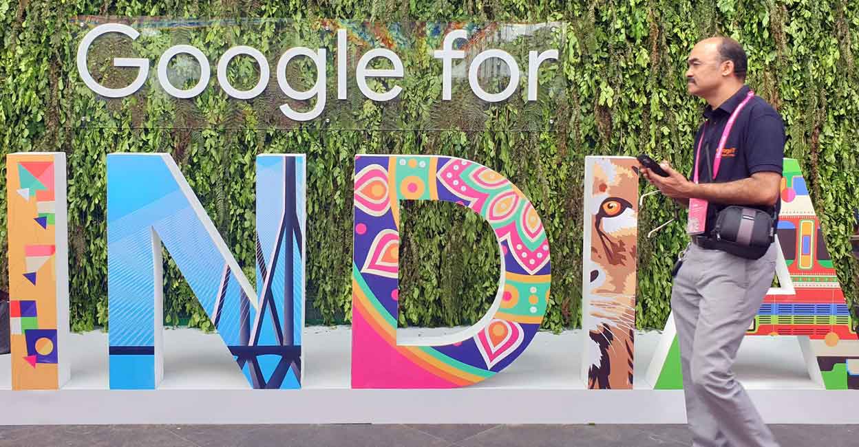 A man walks past the sign "Google for India" at the company's annual technology event in New Delhi, India, September 19, 2019. Photo: Reuters/Sankalp Phartiyal/File