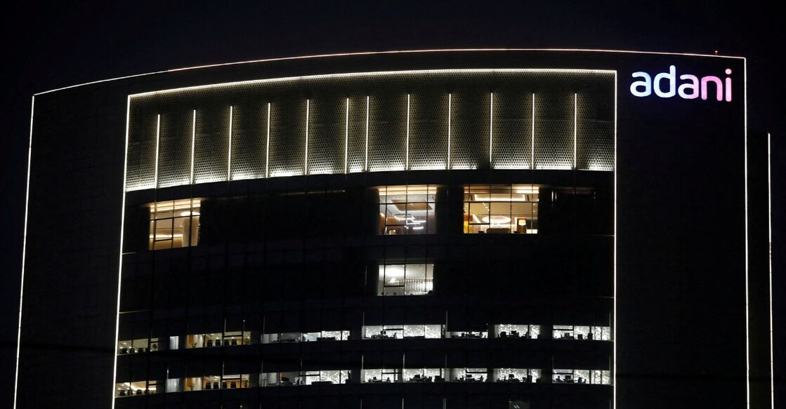 The logo of the Adani Group is seen on the facade of its Corporate House on the outskirts of Ahmedabad, India, January 27, 2023. Photo: Reuters