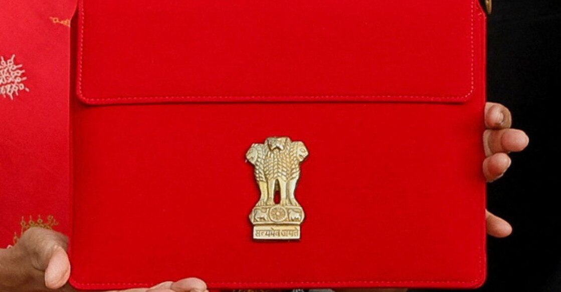 India's Finance Minister Nirmala Sitharaman holds up a folder with the Government of India’s logo as she leaves her office to present the federal budget in the parliament, in New Delhi, India, February 1, 2023. Photo: Reuters