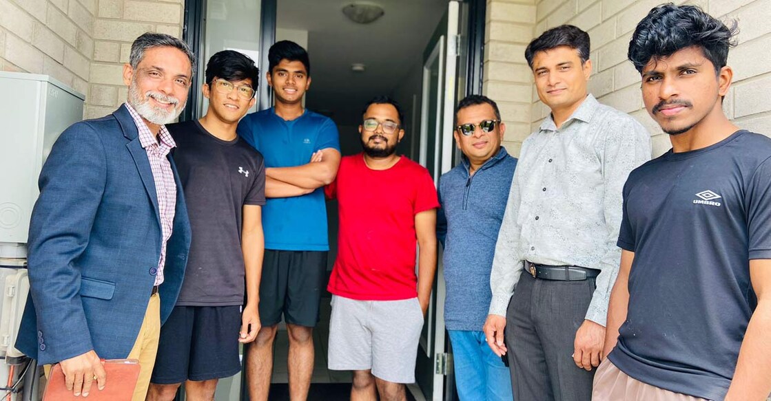 Saju Mathew - Operations Head of Feel At Home with a group of students and landlord during his visit to Canada. Photo: Special Arrangement 