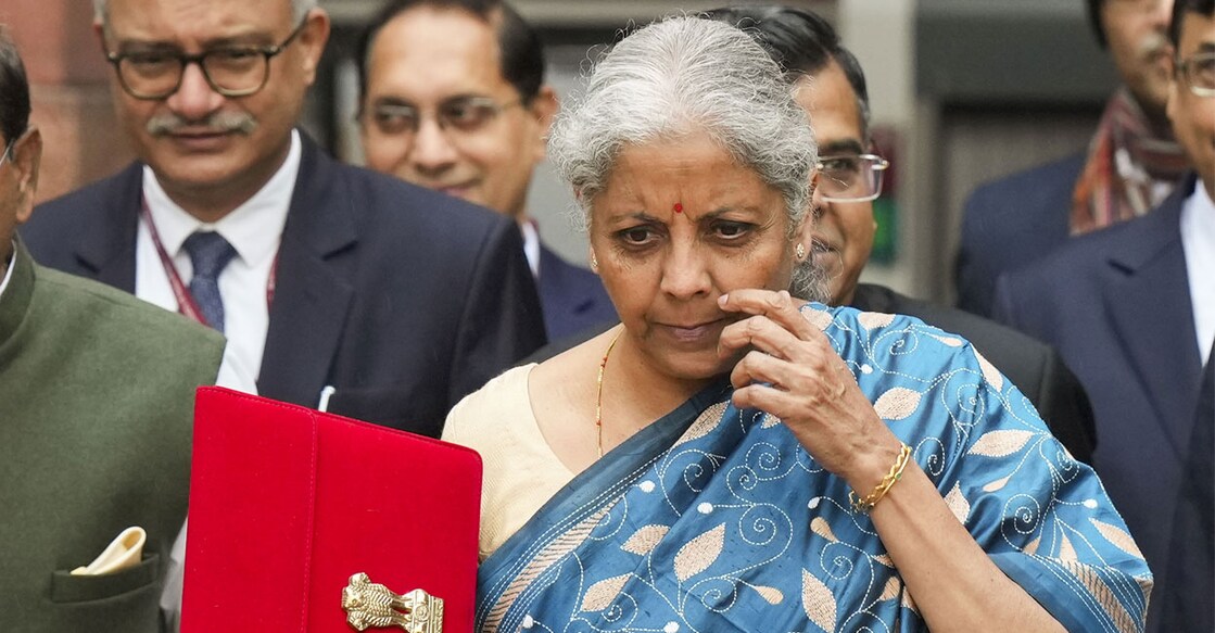 Union Finance Minister Nirmala Sitharaman and other officials outside the Finance Ministry ahead of the presentation of the Interim Budget 2024, in New Delhi. Photo: PTI. 