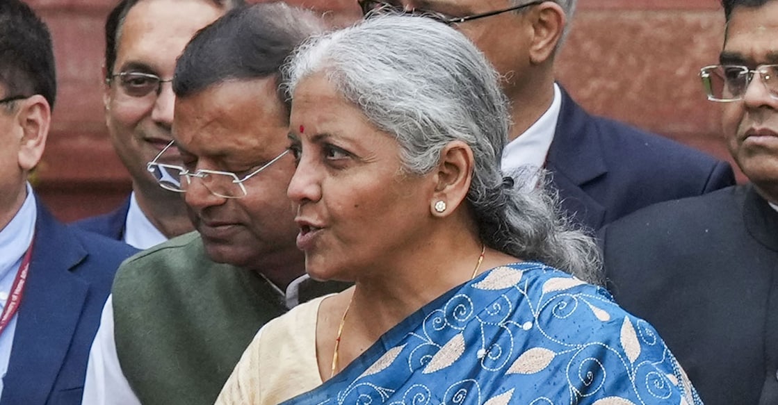 Union Finance Minister Nirmala Sitharaman carrying a folder case containing the Interim Budget 2024 leaves from the Finance Ministry ahead of the presentation of the budget, in New Delhi. Photo: PTI.