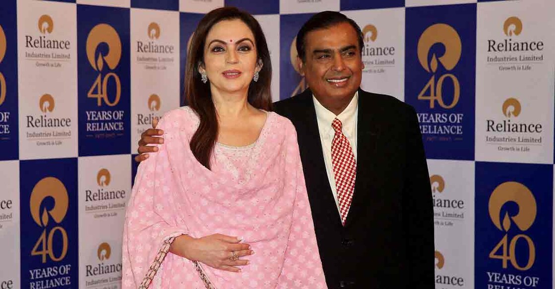 DISNEY-RELIANCE-INDIA-AMBANI Mukesh Ambani, Chairman and Managing Director of Reliance Industries, poses with wife Nita Ambani before addressing the company's annual general meeting in Mumbai, India July 21, 2017. File Photo: REUTERS/Shailesh Andrade