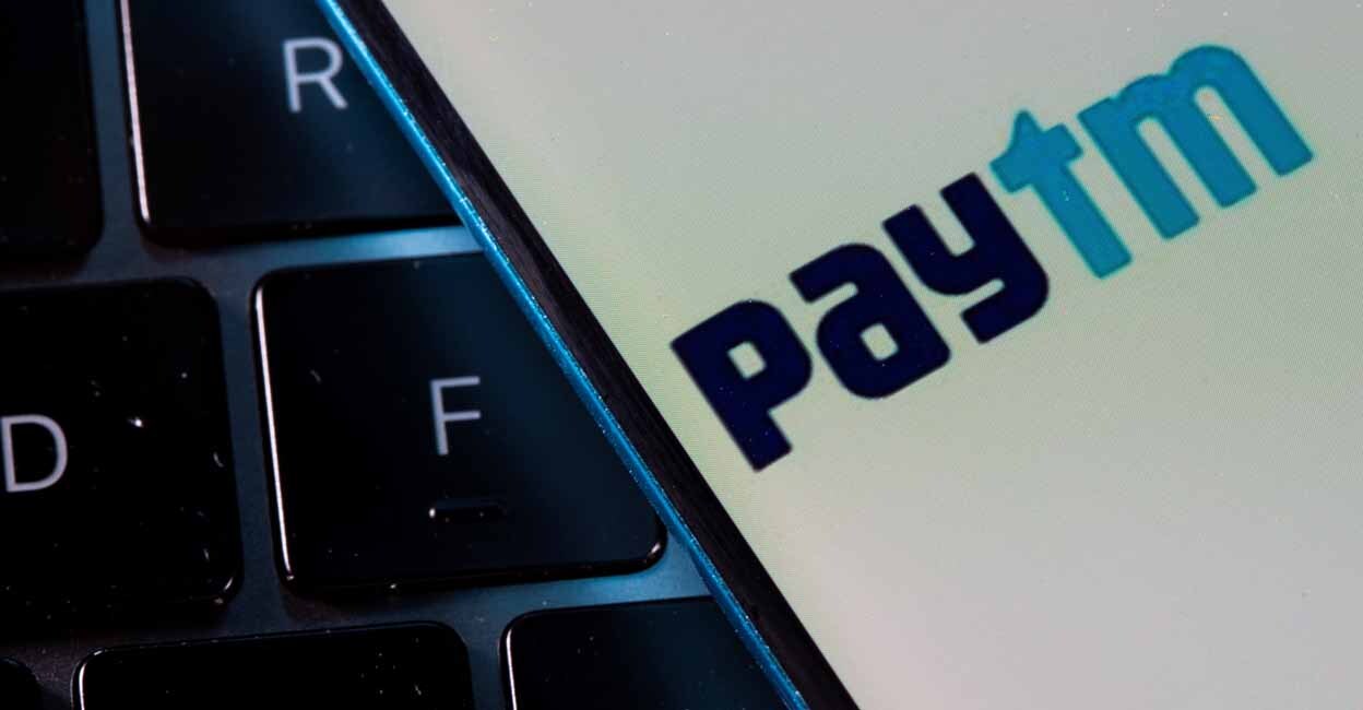A smartphone with the Paytm logo is placed on a laptop in this illustration taken on July 14, 2021. REUTERS/Dado Ruvic/Illustration/Files