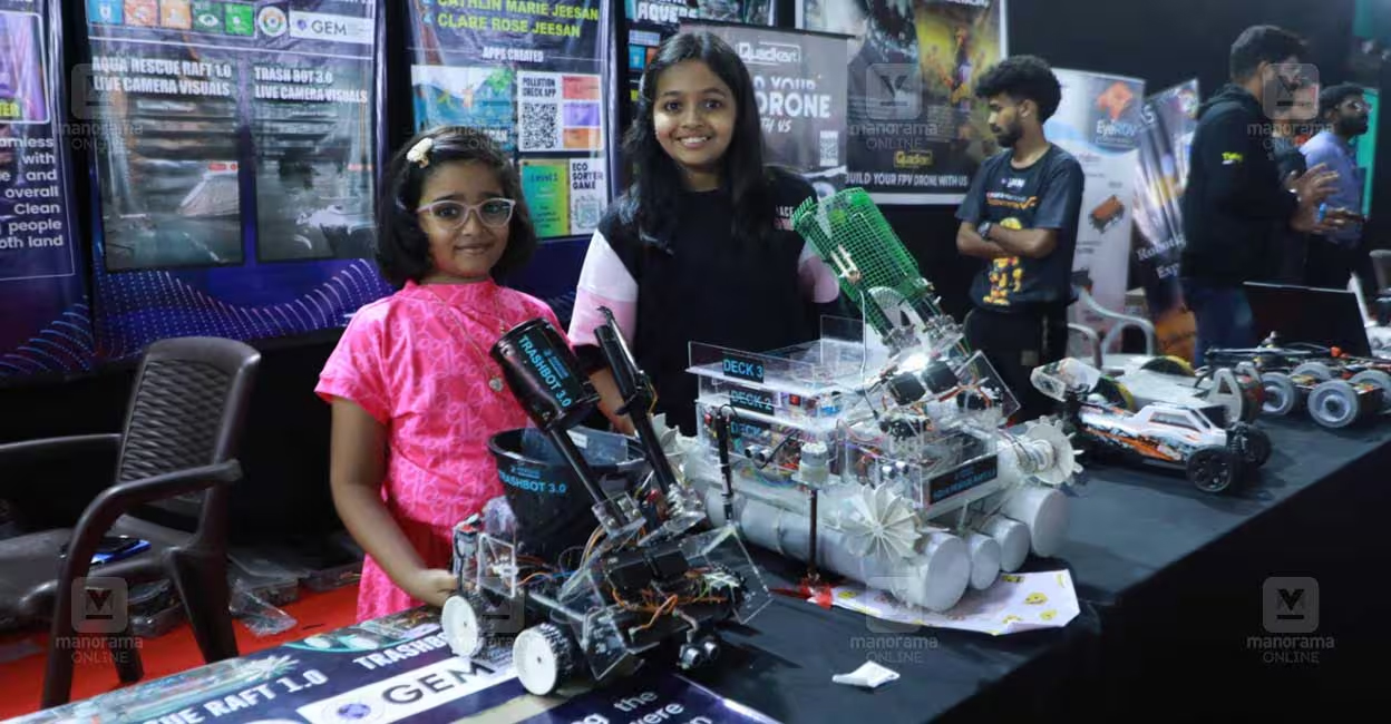 Clare Marie Jeeson and Cathleen Marie Jeeson their robot models on display at the 'Robowers VR' Expo. Photo: Manorama.