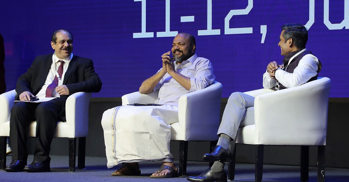 Industries Minister P Rajeeve (centre) speaks at a panel session on 'Government Initiatives for Investment Promotion' at the International GenAI Conclave in Kochi on Friday. (Left) APM Mohammed Hanish, Principal Secretary, (Industries) and Dr Rathan U Kelkar, Secretary, Electronics & IT, are also seen. Photo: Special arrangement