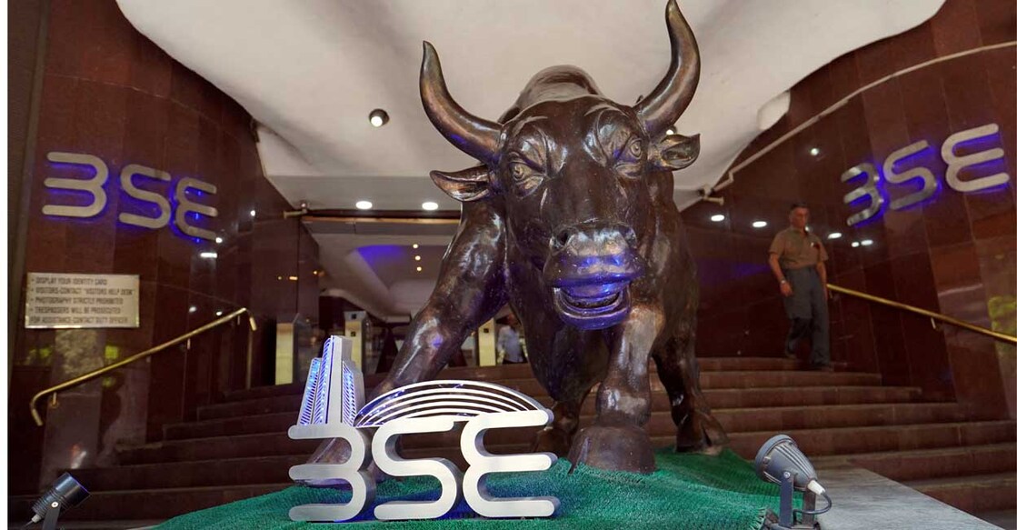 FILE PHOTO: A man walks out of the Bombay Stock Exchange (BSE) building in Mumbai, India, February 28, 2020. REUTERS/Hemanshi Kamani/File Photo
