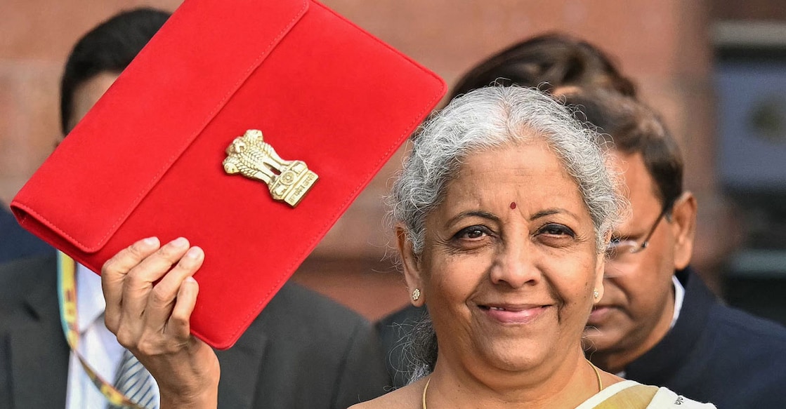 India's Finance Minister Nirmala Sitharaman poses for a photograph as she leaves the ministry of finance to present the annual budget at the parliament in New Delhi on February 1, 2025. Photo: AFP/Money Sharma