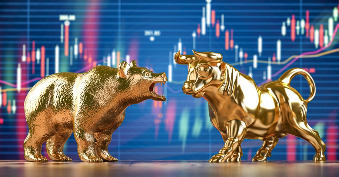Representational image of golden bull and bear on stock data chart background. Photo: iStock/Bet_Noire