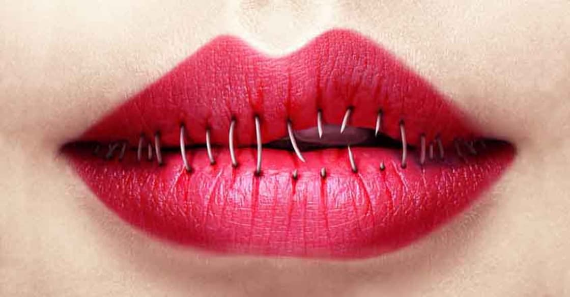 Illustration of lips that are stitched on one side and unstitched on the other.