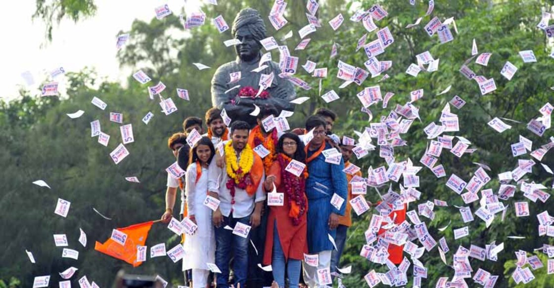 New Delhi: ABVP (RSS-affiliated students organisation) candidates Akshit Dhaiya, Pradeep Tanwar and Shivangi Khaewal celebrate after winning the posts of Delhi University Students Union (DUSU) President, Vice President and Joint Secretary respectively, at the North Campus in New Delhi on Sep 13, 2019. (Photo: IANS) New Delhi: ABVP (RSS-affiliated students organisation) candidates Akshit Dhaiya, Pradeep Tanwar and Shivangi Khaewal celebrate after winning the posts of Delhi University Students Union (DUSU) President, Vice President and Joint Secretary respectively, at the North Campus in New Delhi on Sep 13, 2019. (Photo: IANS)