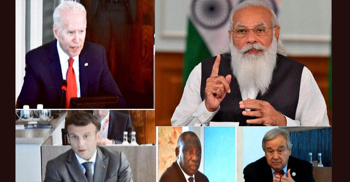 PTI06_13_2021_000027A Prime Minister Narendra Modi participates in the first Outreach Session of the G7 Summit virtually. PTI