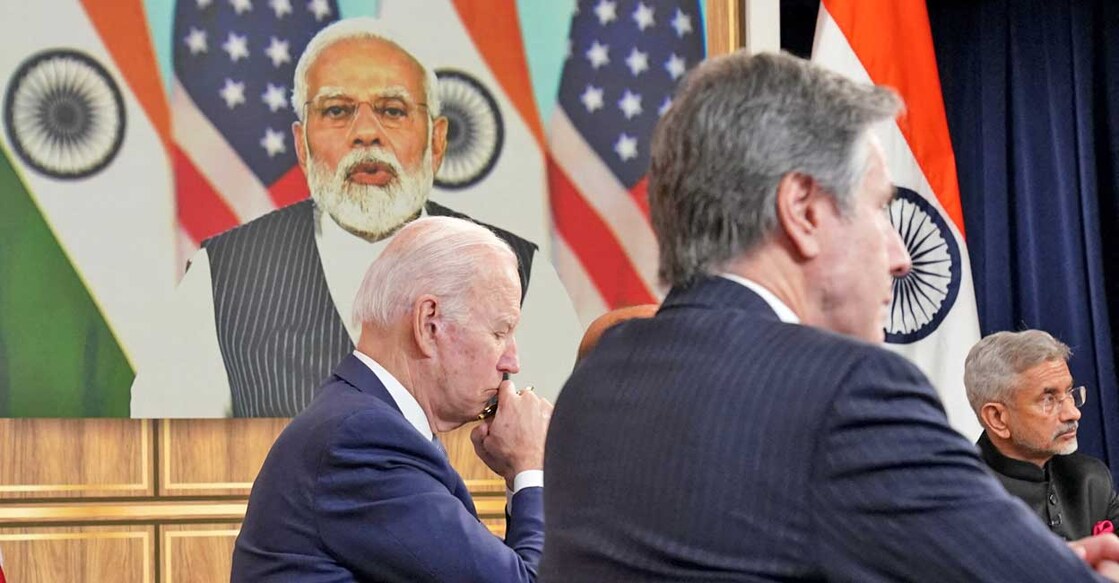 US President Joe Biden, seated with US Secretary of State Antony Blinken and India's Foreign Minister Subrahmanyam Jaishankar, holds a videoconference with India's Prime Minister Narendra Modi to discuss Russia's war with Ukraine from the White House in Washington, April 11, 2022. Photo: Kevin Lamarque/Reuters
