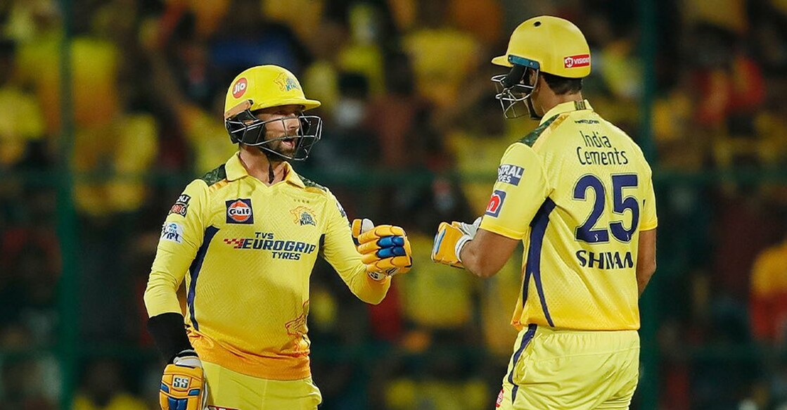 CSK's Devon Conway (left) and Shivam Dube held an 80-run stand for the third wicket against RCB. Photo: Twitter/@ChennaiIPL