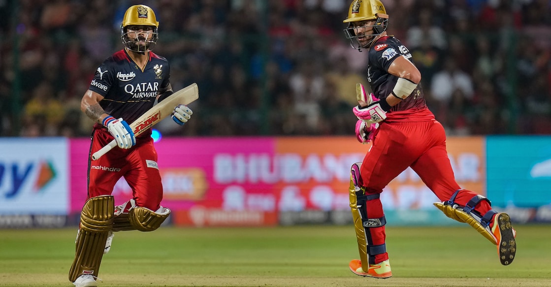 Royal Challengers Bangalore captain Faf du Plessis and Virat Kohli run between the wickets during the IPL match against Mumbai Indians at M Chinnaswamy Stadium, in Bengaluru on Sunday. Photo: PTI/Shailendra Bhojak