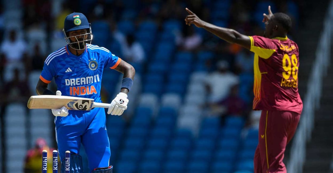 Hardik Pandya of India walks off the field after being dismissed by Jason Holder of West Indies during the first T20I at Brian Lara Cricket Academy in Tarouba, Trinidad and Tobago, on Thursday. Photo: AFP/Randy Brooks