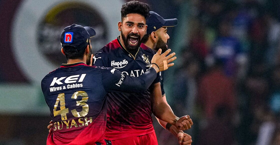 Royal Challengers Bangalore bowler Mohammed Siraj celebrates the wicket of Lucknow Super Giants batter Kyle Mayers during the IPL in Lucknow on Monday. Photo: PTI