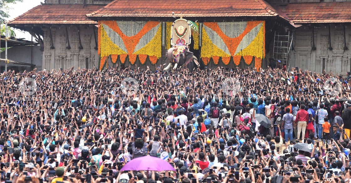 Tusker Ernakulam Sivakumar greeting a huge gathering outside the Thekke Gopura Nada of Vadakkunnathan Temple after the 'vilambaram' of Thrissur Pooram on Saturday. Photo: Manorama