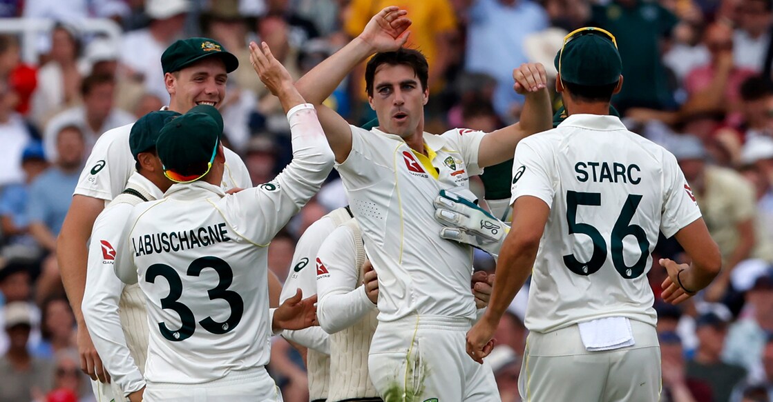 Australia's Pat Cummins (centre) celebrates with teammates after bowling England's Harry Brook on day four of the second Ashes Test at Lord's cricket ground in London on Saturday. Photo: AFP/Ian Kington
