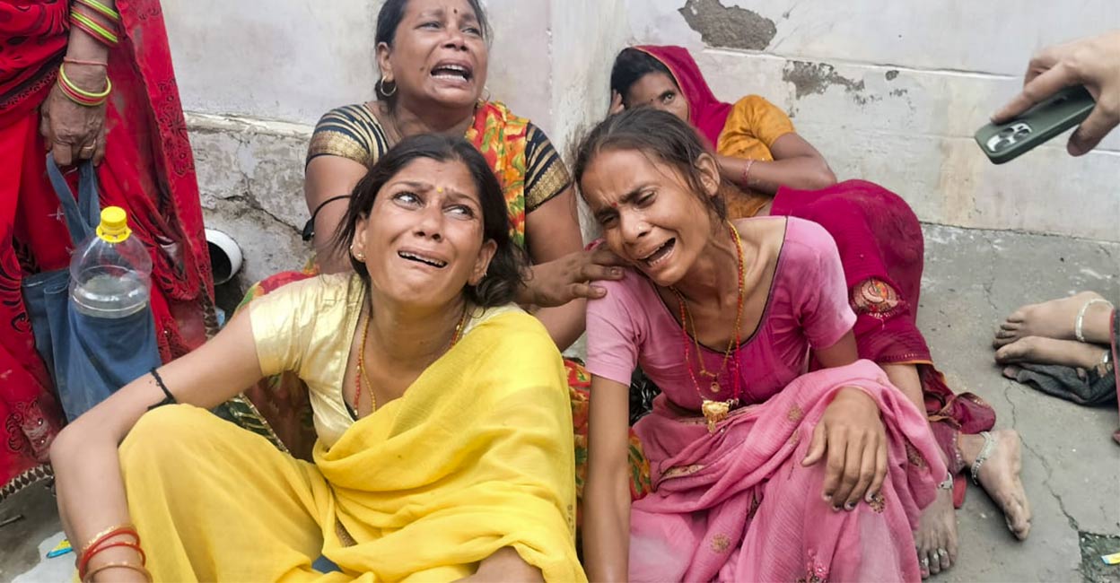 hathras-stampede-ls Relatives outside a hospital where victims of the Hathras' stampede are admitted, in Etah, Tuesday, July 2, 2024. Photo: PTI.