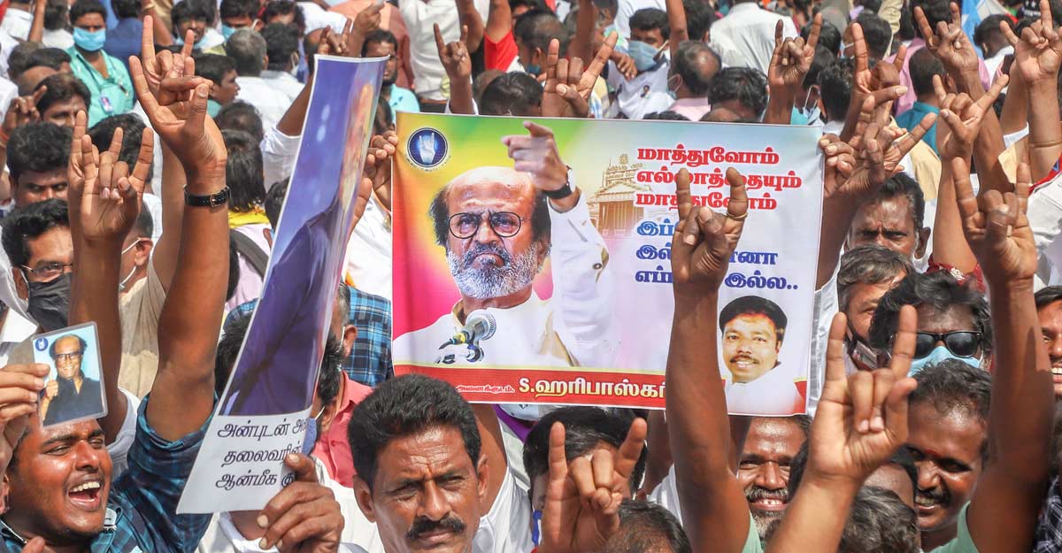 Fans of superstar Rajinikanth stage a demonstration demanding from him to join politics as earlier as promised, at Valluvar Kottam in Chennai, Sunday, Jan. 10, 2021. The actor, who finally appeared ready to launch his political party with a "now or never" announcement about a month ago, has now decided to opt for the latter course, citing health concerns. (PTI Photo)