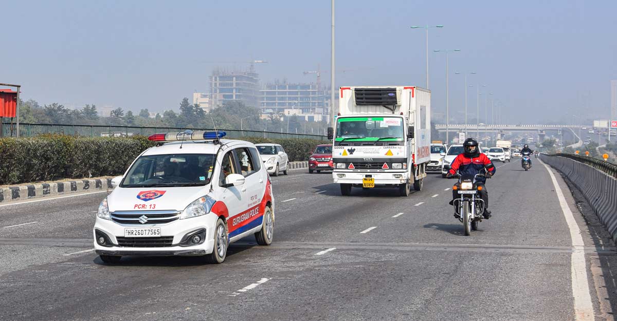 Covishield First consignment of Covishield vaccine, dispatched from Pune's Serum Institute of India, being transported in a temperature-controlled truck amid tight security arrangements, after arrival at the IGI Airport, in Gurgaon, Tuesday, Jan. 12, 2021. (PTI Photo)