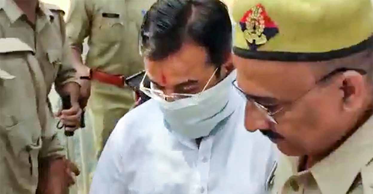 Ashish Mishra, accused in the Tikonia violence case, arrives at the Crime Branch office in Lakhimpur Kheri, Saturday, Oct. 9, 2021.