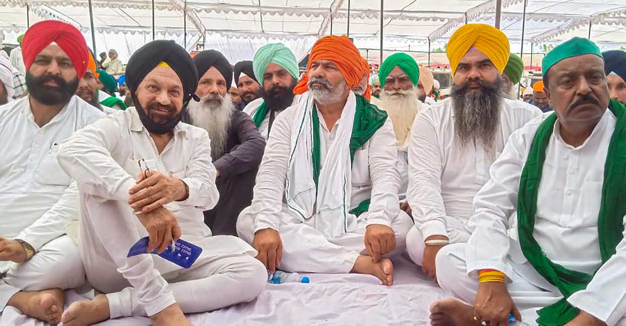 Bharatiya Kisan Union spokesperson Rakesh Tikait with others attend the 'Antim Ardas' of farmers