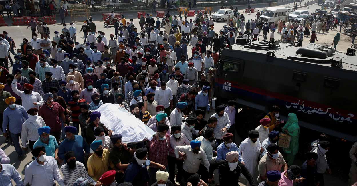 Supinder Kour People carry the body of Supinder Kour, a school teacher who was shot and killed by suspected militants on Thursday, during her funeral in Srinagar, October 8, 2021. Reuters/Danish Ismail
